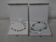 An as new Coeur De Lion Geo Cube Light Green Bracelet 4017/30-0520 (RRP £75) and an as new Coeur