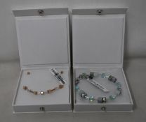 An as new Coeur De Lion Geo Cube Light Green Bracelet 4017/30-0520 (RRP £75) and an as new Coeur
