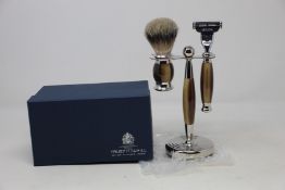 A boxed as new Truefitt & Hill Faux Horn Edwardian Shaving Set; Badger Brush, Mach III Razor and