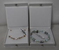 An as new Coeur De Lion Geo Cube Light Green Bracelet 4017/30-0520 (RRP £75) and an as new Coeur