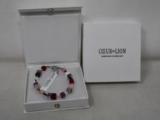 Two as new Coeur De Lion Red Purple Swarovski Crystal Bracelet 4905/30-0308 (RRP £95).