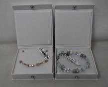 An as new Coeur De Lion Geo Cube Light Green Bracelet 4017/30-0520 (RRP £75) and an as new Coeur