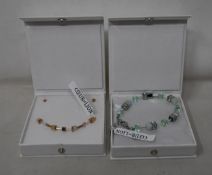 An as new Coeur De Lion Geo Cube Light Green Bracelet 4017/30-0520 (RRP £75) and an as new Coeur