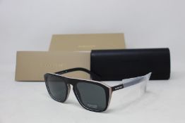 A pair of as new Burberry sunglasses.