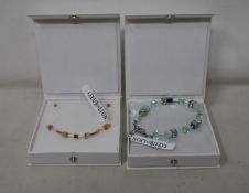An as new Coeur De Lion Geo Cube Light Green Bracelet 4017/30-0520 (RRP £75) and an as new Coeur
