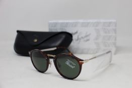 A pair of as new Persol Calligraphy Edition sunglasses.