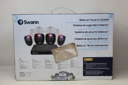 A boxed as new Swann Enforcer Security System 4 camera set.