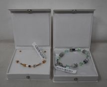 An as new Coeur De Lion Geo Cube Light Green Bracelet 4017/30-0520 (RRP £75) and an as new Coeur