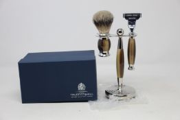 A boxed as new Truefitt & Hill Faux Horn Edwardian Shaving Set; Badger Brush, Mach III Razor and