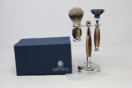 A boxed as new Truefitt & Hill Faux Horn Edwardian Shaving Set; Badger Brush, Mach III Razor and