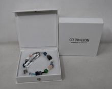 Two as new Coeur De Lion Blue Green Grey Mixed Geo Cube Bracelet 4905/30-0705 (RRP £95).