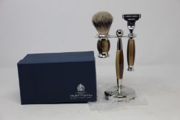 A boxed as new Truefitt & Hill Faux Horn Edwardian Shaving Set; Badger Brush, Mach III Razor and