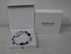 Two as new Coeur De Lion Blue Green Grey Mixed Geo Cube Bracelet 4905/30-0705 (RRP £95).