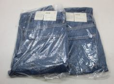 Two pairs of as new Agolde Riley jeans (Size 27).