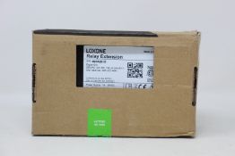 A boxed as new Loxone Relay Extension (Item no. 100038).