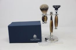 A boxed as new Truefitt & Hill Faux Horn Edwardian Shaving Set; Badger Brush, Mach III Razor and