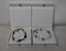 An as new Coeur De Lion Geo Cube Gree-Beige and Rose Bracelet 4905/30-0510 (RRP £95) and an as new