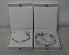 An as new Coeur De Lion Geo Cube Light Green Bracelet 4017/30-0520 (RRP £75) and an as new Coeur