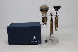 A boxed as new Truefitt & Hill Faux Horn Edwardian Shaving Set; Badger Brush, Mach III Razor and