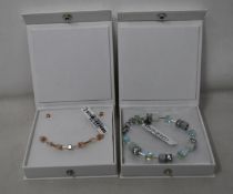 An as new Coeur De Lion Geo Cube Light Green Bracelet 4017/30-0520 (RRP £75) and an as new Coeur
