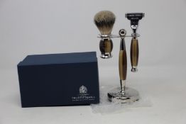 A boxed as new Truefitt & Hill Faux Horn Edwardian Shaving Set; Badger Brush, Mach III Razor and