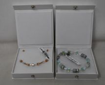 An as new Coeur De Lion Geo Cube Light Green Bracelet 4017/30-0520 (RRP £75) and an as new Coeur