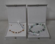 An as new Coeur De Lion Geo Cube Light Green Bracelet 4017/30-0520 (RRP £75) and an as new Coeur