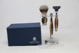 A boxed as new Truefitt & Hill Faux Horn Edwardian Shaving Set; Badger Brush, Mach III Razor and