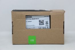 A boxed as new Loxone Dimmer Extension (Item no. 100029).