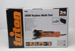 A boxed as new Triton TMUTL 300W Keyless Multi-Tool.