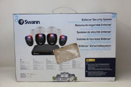 A boxed as new Swann Enforcer Security System 4 camera set.