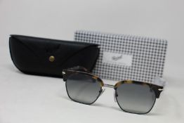 A pair of as new Persol Tailoring Edition sunglasses.