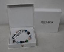 Two as new Coeur De Lion Blue Green Grey Mixed Geo Cube Bracelet 4905/30-0705 (RRP £95).