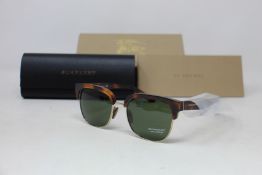 A pair of as new Burberry sunglasses.