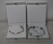 An as new Coeur De Lion Geo Cube Light Green Bracelet 4017/30-0520 (RRP £75) and an as new Coeur