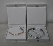 An as new Coeur De Lion Geo Cube Light Green Bracelet 4017/30-0520 (RRP £75) and an as new Coeur