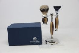 A boxed as new Truefitt & Hill Faux Horn Edwardian Shaving Set; Badger Brush, Mach III Razor and
