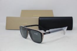 A pair of as new Burberry sunglasses.