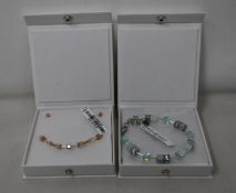An as new Coeur De Lion Geo Cube Light Green Bracelet 4017/30-0520 (RRP £75) and an as new Coeur
