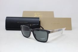 A pair of as new Burberry sunglasses.