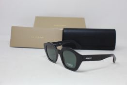 A pair of as new Burberry sunglasses.