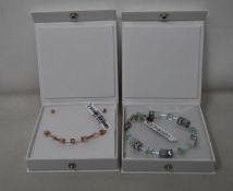 An as new Coeur De Lion Geo Cube Light Green Bracelet 4017/30-0520 (RRP £75) and an as new Coeur