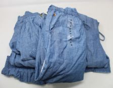 Seven girls Ralph Lauren indigo blue smock rompers (Assorted sizes).