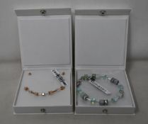 An as new Coeur De Lion Geo Cube Light Green Bracelet 4017/30-0520 (RRP £75) and an as new Coeur