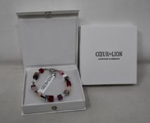 Two as new Coeur De Lion Red Purple Swarovski Crystal Bracelet 4905/30-0308 (RRP £95).