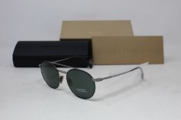 A pair of as new Burberry sunglasses.