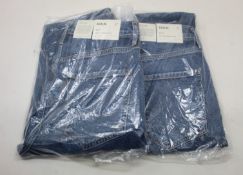 Two pairs of as new Agolde Riley jeans (Size 27).
