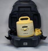 A Medela Symphony double electric breast pump (Unit and case only).