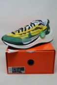 A pair of as new Nike Vaporwaffle Sacai Tour Yellow with authentication tag (UK 10).