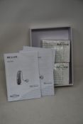 Two boxed Specsavers Advanced RIC LI 819 hearing instruments (HA RIC 819 SLV).